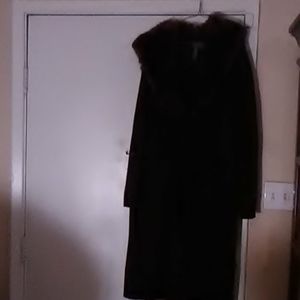 Womens long sweater with fur collar.